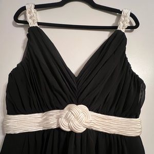 Classic black dress with braiding detail